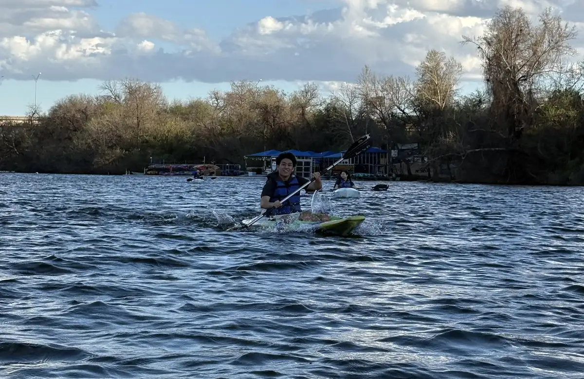 Daniel kayaking on a lake